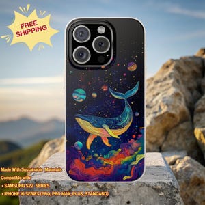 May include: A phone case featuring a colorful illustration of a whale swimming in a starry night sky. The case has a clear border and is compatible with Samsung S22 series and iPhone 16 series phones. The case is made with sustainable materials.