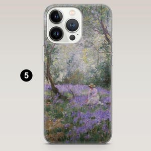 May include: Transparent phone case displaying a painting of a person in a white dress and hat amidst purple flowers. The artwork shows a forest scene with trees and foliage, creating a peaceful, natural atmosphere.