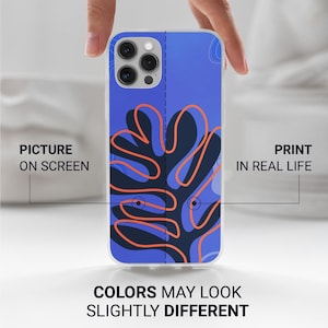 May include: A clear phone case with a blue and navy abstract design featuring orange outlines. The text on the case reads "Picture on Screen" and "Print in Real Life". The bottom of the case reads "Colors May Look Slightly Different".