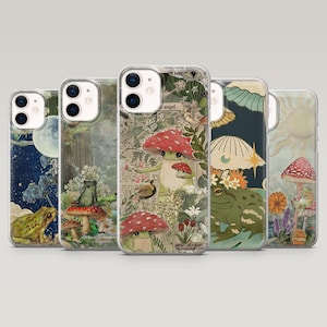 May include: Five phone cases with unique, whimsical designs. Each case showcases a different illustration, including frogs, mushrooms, and celestial elements. The cases have a clear border and a glossy finish, providing protection and style.