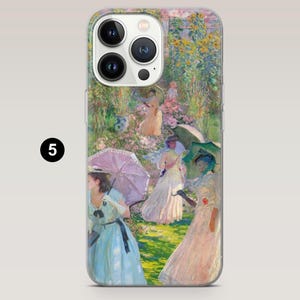 May include: A phone case with a colorful painting of women in a garden with umbrellas. The painting is in a style reminiscent of Impressionism.