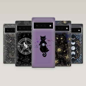 May include: Five phone cases with various designs. One case is lilac with a black cat holding a crystal ball. Other cases feature celestial and occult themes, including moons, stars, and a pentagram with a cat. The cases have a clear border.