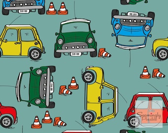 May include: A seamless pattern featuring a variety of colorful mini cars with the text "CAR-100" on the license plates. The cars are driving through a blue background with orange traffic cones.