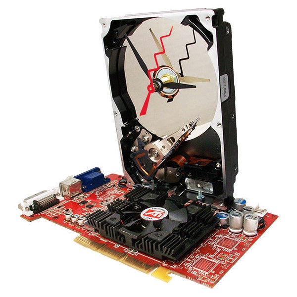 Hard Drive Clock Gadget has Red Graphics Circuit Board, Cooling Tower & Fan as the Base.