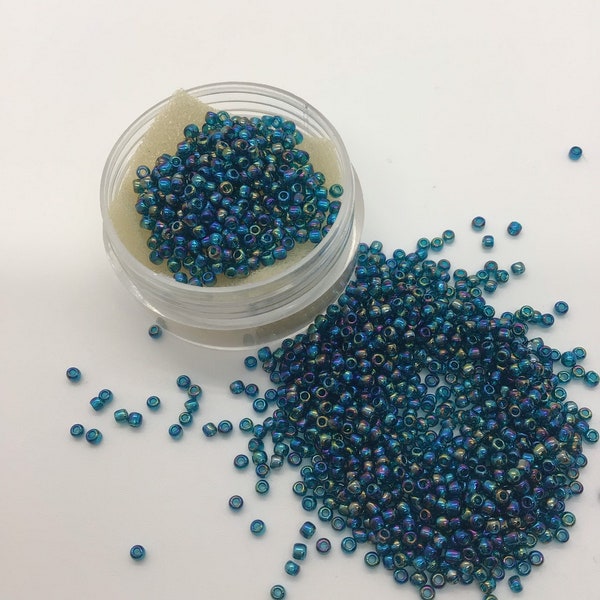 SB 11- Transparent Rainbow Teal Toho Round 11/0 Seed Beads