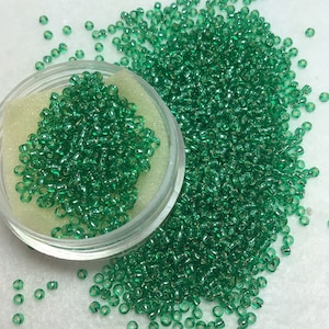 SB 11- Silver Lined Dark Peridot Toho Round 11/0 Seed Beads