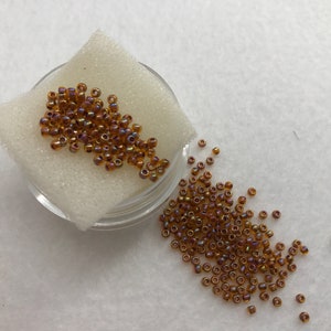 SB 11-Rnbw Hyacinth/Opaque Purple Toho Round 11/0 Seed Beads