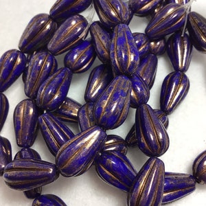 CZE 8x15mm Melon Drop Indigo with Gold Finish and Bronze Wash Czech Beads