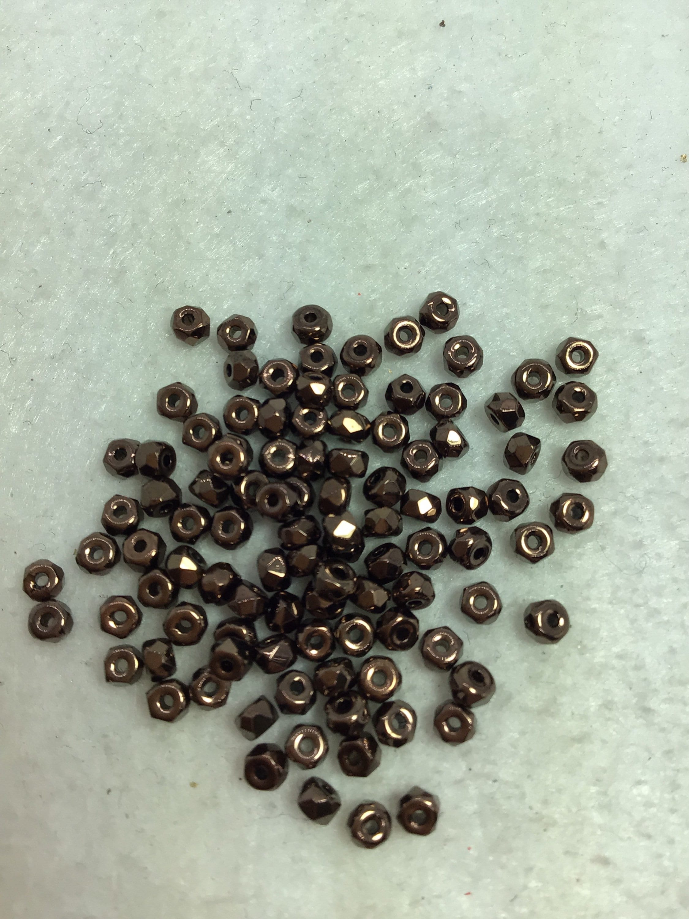 Buy CZE 2x3mm Faceted Micro Spacer Dark Bronze Online in India 