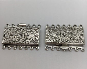 Cierre de caja de 7 hilos de 26x36 mm de latón plateado