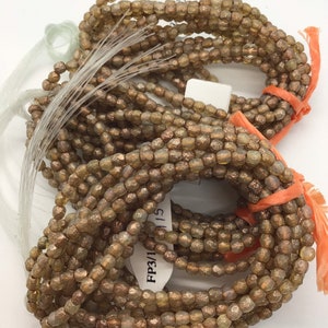 FP 3mm Fire Polished Champagne with Etched and Gold finish and Copper Wash Czech Beads