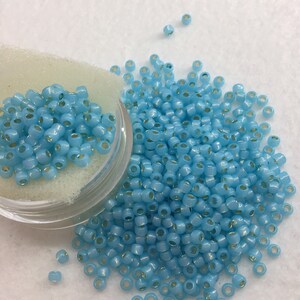 SB 8-Silver Lined Milky AquaToho Round 8/0 Seed Beads