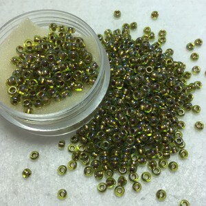 SB 8- Gold Lined PeridotToho Round 8/0 Seed Beads