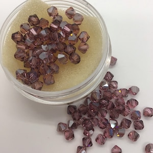 5301 4mm Swarovski Bicone Light Rose Satin
