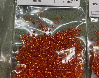 DB045 Silver Lined Orange Miyuki Delica Cylinder Bead 11/o sold per 8g tube