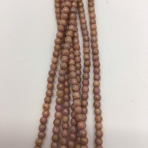 2mm Druk Luster Opaque Rose/Gold Topaz Czech Beads
