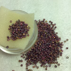 SB DB1013 11/0 Miyuki Delica  Metallic Tea Berry Gold Iris