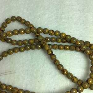 CZE 4mm Druk Orange with Mercury Picasso Finish Czech Beads