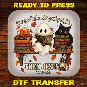 May include: A DTF transfer design featuring a white ghost reading a book, a black cat, and a pumpkin mug on shelves. Text reads: it was a dark and spooky night... THEN JESUS. The end. Decorated with autumn leaves, a spider web, and a lantern.