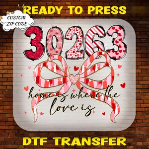 May include: A DTF transfer design featuring the numbers "30263" in red and pink patterns, a large bow, and the phrase "home is where the love is." The design is on a white background with a brick wall border. The words "READY TO PRESS" and "DTF TRANSFER" are also present.