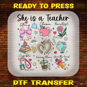 May include: A DTF transfer sheet featuring the text "She is a Teacher" and various colorful illustrations including a pink bow, a checkered apple, a flower, a stack of books, a heart-shaped pencil, a globe, a lanyard, a coffee cup, and a pencil.