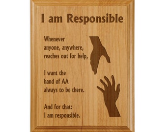以下が含まれることがあります： 「I am Responsible」というテキストと、他人を助けることについての引用が書かれた木製の銘板。引用は次のとおりです。「Whenever anyone, anywhere, reaches out for help, I want the hand of AA always to be there. And for that: I am responsible.」