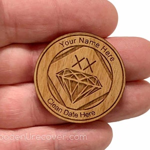 May include: A round wooden token with a diamond design and the text "Your Name Here" and "Clean Date Here".