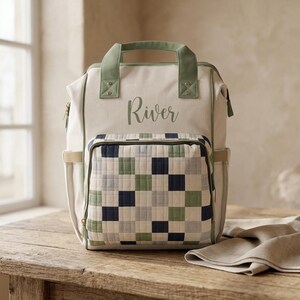 Zaino fasciatoio PERSONALIZZATO con motivo patchwork a quadri verdi e finta trapuntatura.