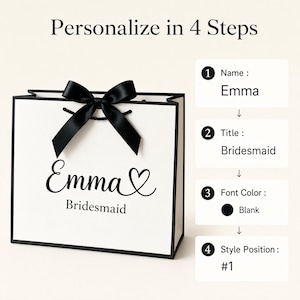 May include: White gift bag with black trim and a black bow. The bag is personalized with the name "Emma" and the title "Bridesmaid" in black script. The image also shows the steps to personalize the bag.