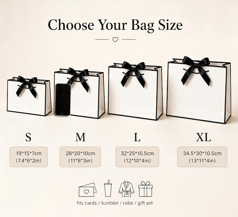 May include: Four white gift bags with black trim and bows, labeled S, M, L, and XL. The bags have dimensions in inches and centimeters. The image includes the text "Choose Your Bag Size" and icons for cards, a tumbler, a robe, and a gift set.