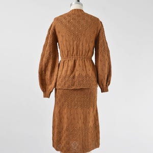 Full back view of Vintage 70s brown hand knit sweater and skirt set.