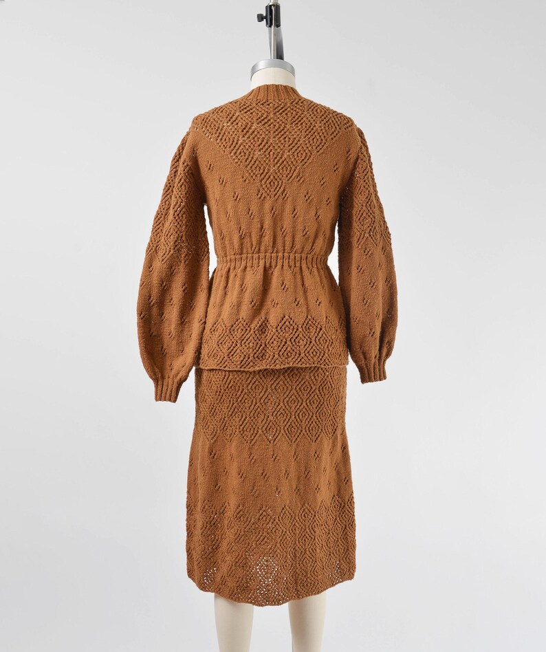 Full back view of Vintage 70s brown hand knit sweater and skirt set.