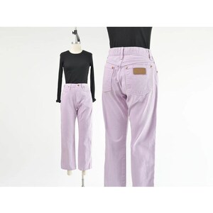 Vintage 90s western style Wrangler jeans. Light purple denim. High waisted. Straight legs. Displayed on dress form with a black t-shirt.
