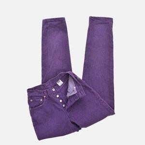 vintage 80s purple Levi's high waisted slim fit tapered leg jeans with button down fly.