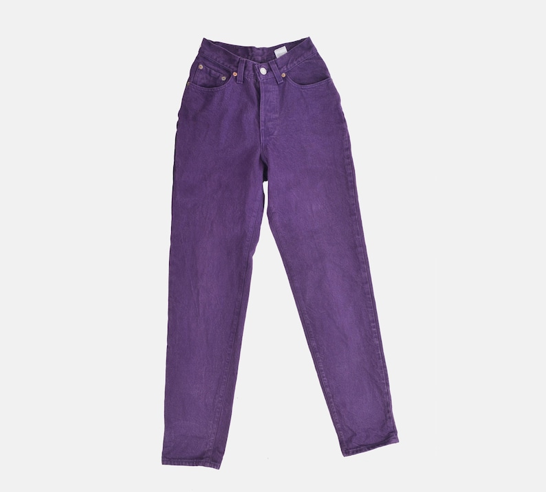 vintage 80s purple Levi's high waisted slim fit tapered leg jeans with button down fly.