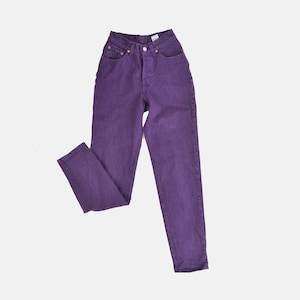 vintage 80s purple Levi's high waisted slim fit tapered leg jeans with button down fly.