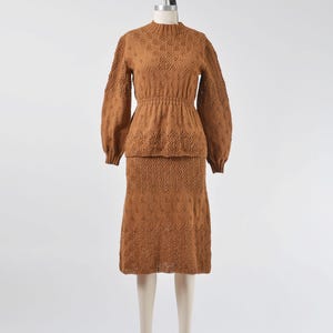 Full front view of Vintage 70s brown hand knit sweater and skirt set.