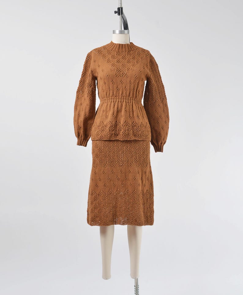 Full front view of Vintage 70s brown hand knit sweater and skirt set.