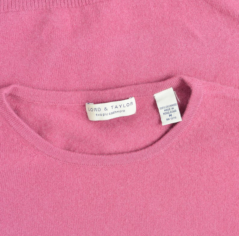 Lord & Taylor label inside of a vintage cashmere sweater.