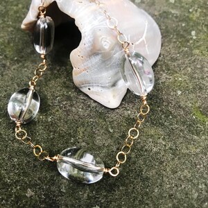 the "jennifer" bracelet crystal quartz affixed to open link gold filled chain with lobster clasp (6-7" custom sizing)