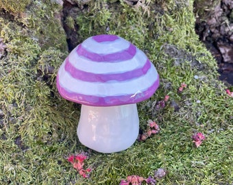 purple and white striped ceramic mushroom