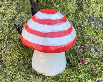 red and white striped ceramic mushroom