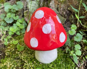 red and white ceramic mushroom