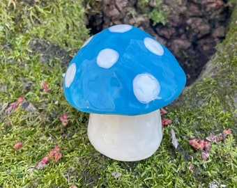 blue and white ceramic mushroom