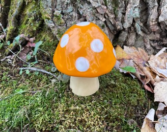 orange and white ceramic mushroom