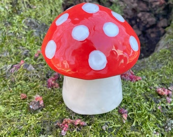 red and white ceramic mushroom