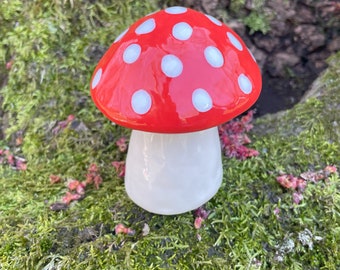 red and white ceramic mushroom