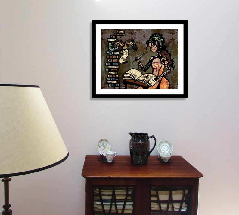 May include: A framed illustration of a woman writing in a book with a bird perched on a stack of books behind her. The woman is wearing a long dress and has long brown hair. The background is a textured brown color.
