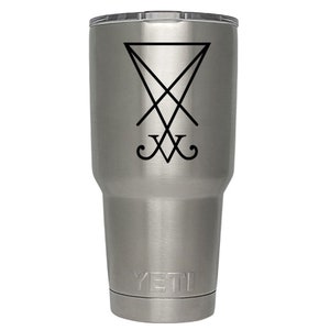 May include: A stainless steel YETI tumbler with a black sigil of Baphomet, a symbol associated with Satanism, printed on the side.