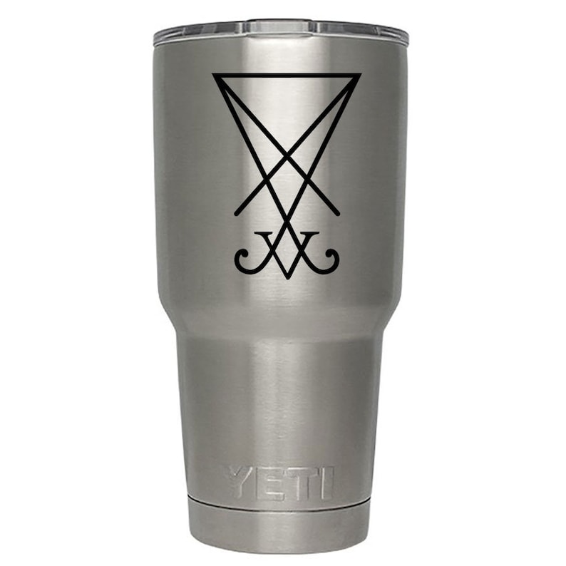 May include: A stainless steel YETI tumbler with a black sigil of Baphomet, a symbol associated with Satanism, printed on the side.